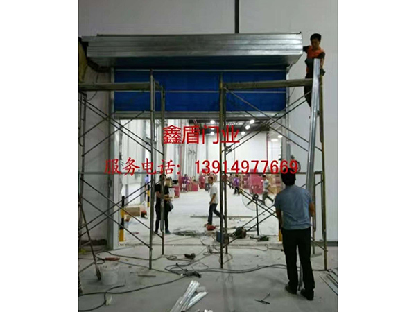 電動(dòng)無(wú)極布防火卷簾門